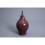 A Chinese monochrome liver red vase mounted as lamp, Kangxi