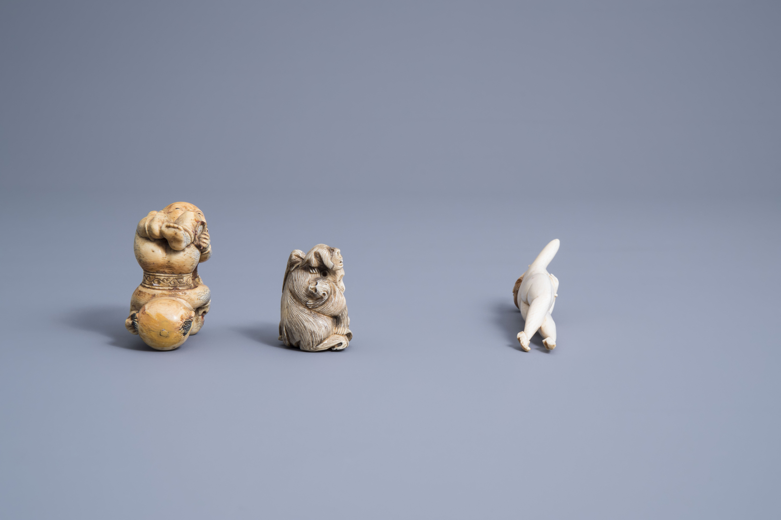 A Chinese ivory doctor's lady, a model of a lady, a pair of 'Hoho' brothers and a group of monkeys, - Image 9 of 13