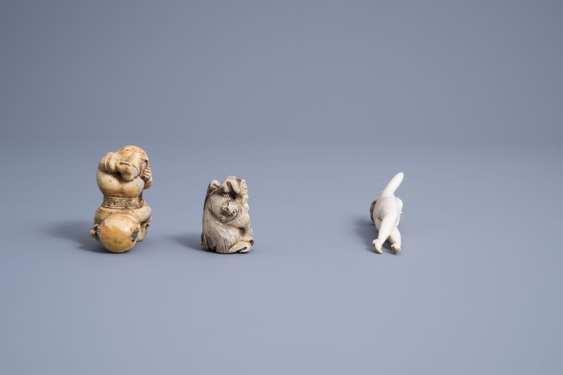 A Chinese ivory doctor's lady, a model of a lady, a pair of 'Hoho' brothers and a group of monkeys, - Image 9 of 13