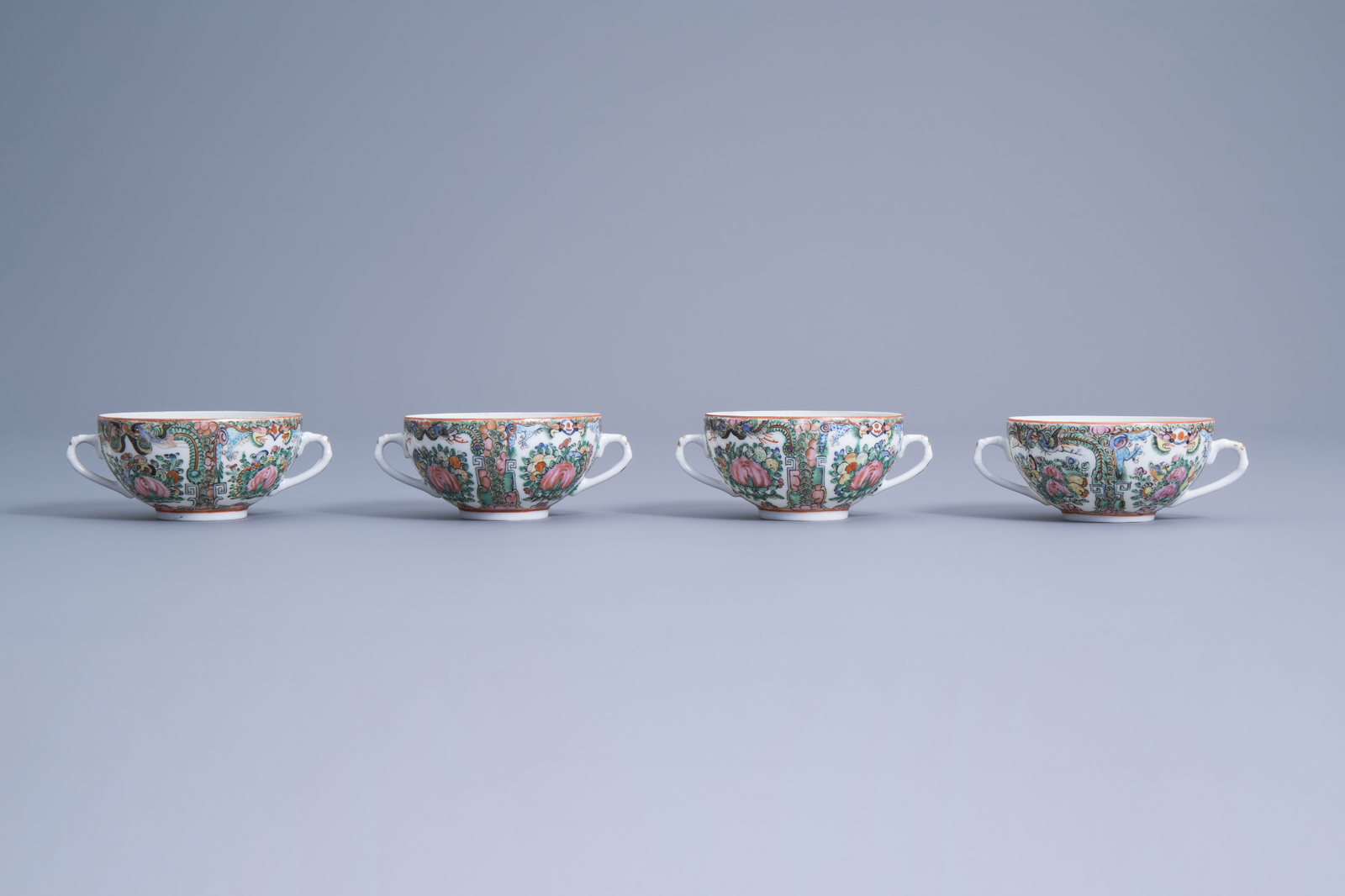 Four Chinese Canton famille rose cups, five saucers, two spoons and a wooden tray with inlay, 20th C - Image 8 of 17