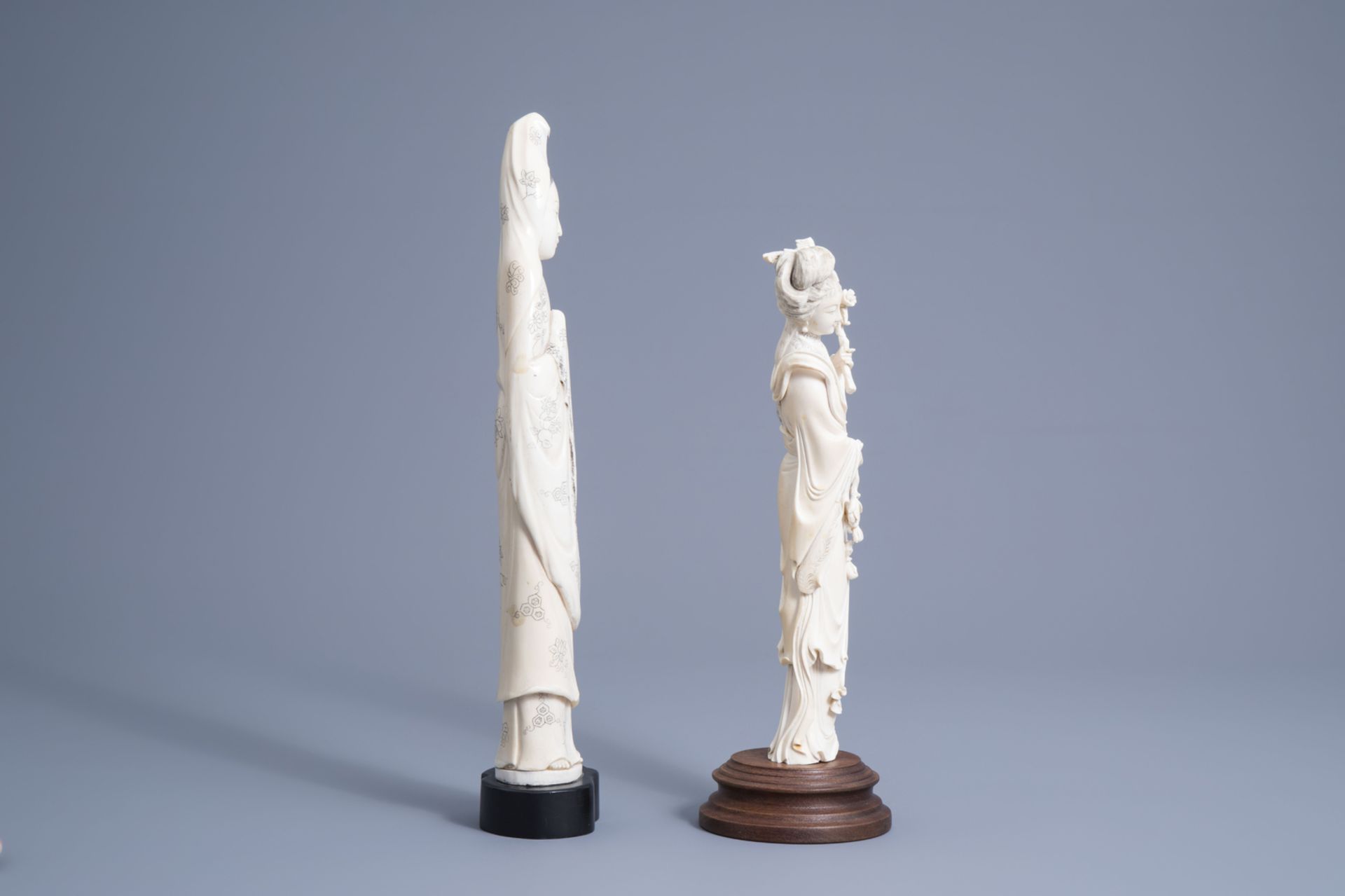 A large Chinese ivory figure of Guanyin and one of a lady with blossoming branches, early 20th C. - Image 2 of 6