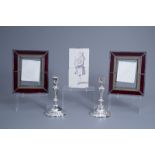 A pair of silver plated candlesticks, two lithophanes and a tile mural, various origins, 19th/20th C