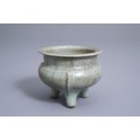 A Chinese monochrome celadon and crackle glazed tripod censer, Ming
