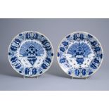 Two Dutch Delft blue and white 'peacock tail' chargers, 18th C.