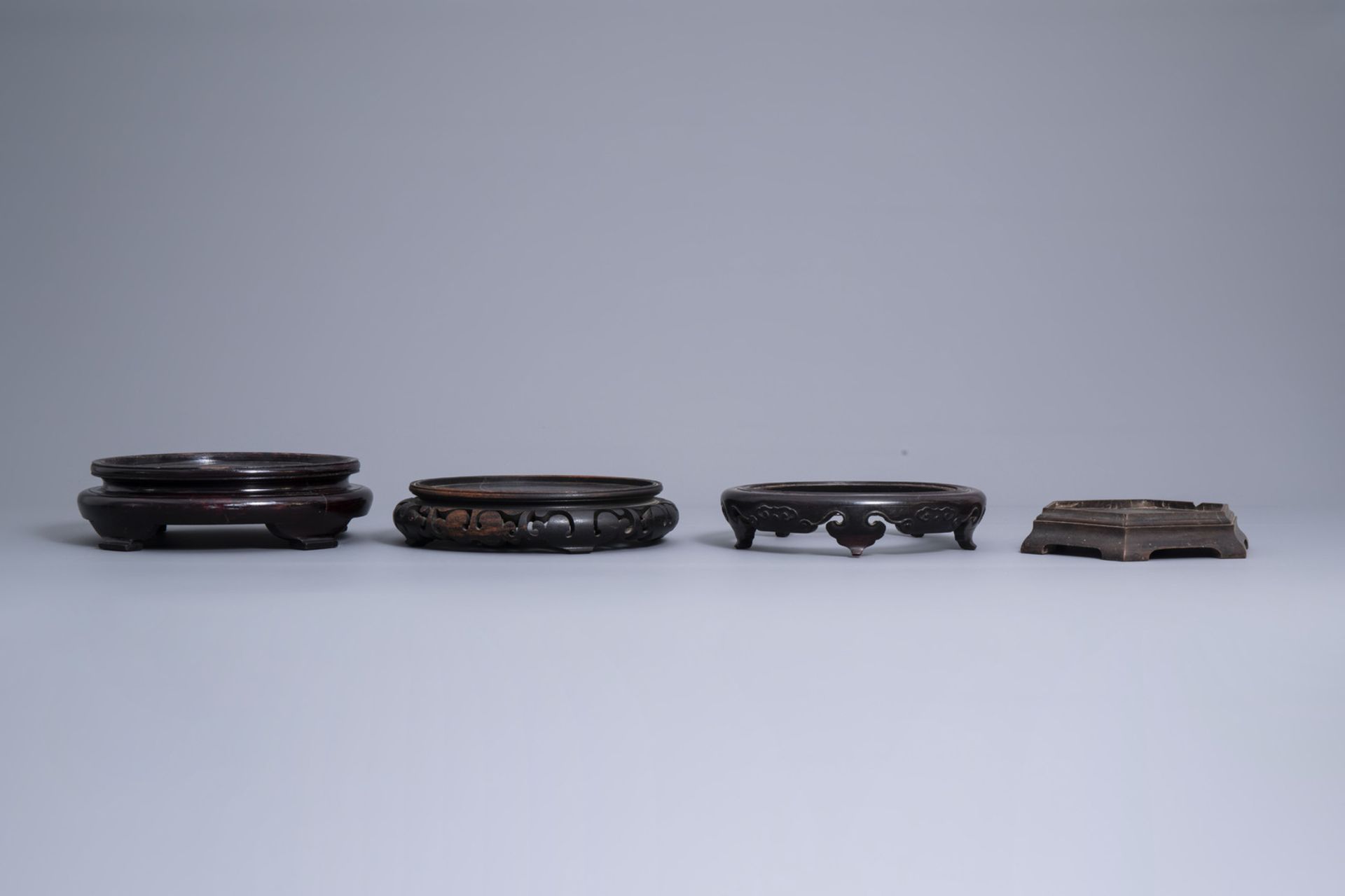 A collection of Chinese wooden stands, 19th/20th C. - Image 11 of 23