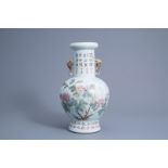 A Chinese qianjiang cai vase with floral design, 19th/20th C.