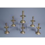 Six brass and bronze disc or so-called 'heemskerk' candlesticks, the Low Countries, 17th C. and late