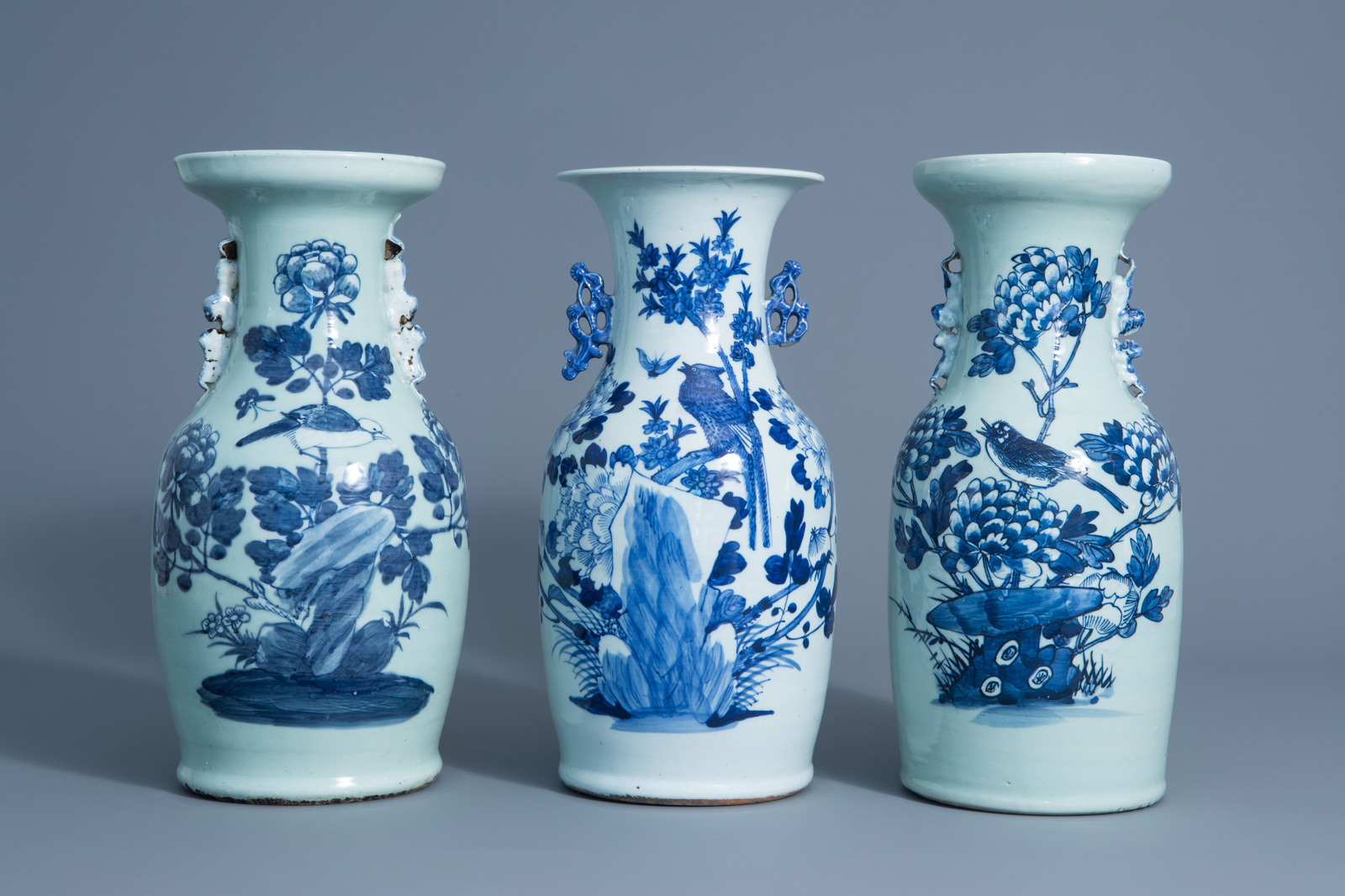 Three Chinese blue and white celadon vases with birds on a branch, 19th C.