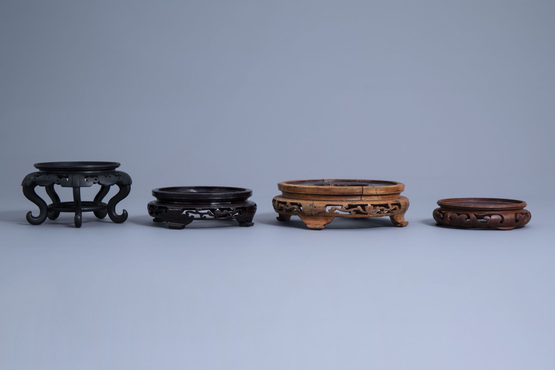 A collection of Chinese carved wooden stands, 19th/20th C. - Image 10 of 19