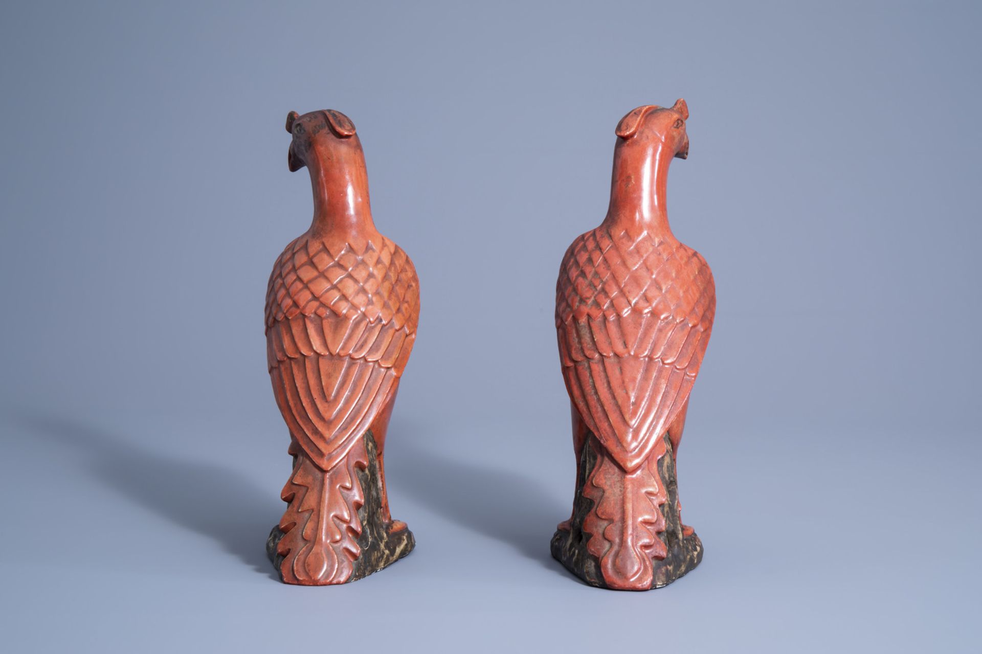 A pair of Chinese coral red and brown models of parrots, 20th C. - Image 3 of 7