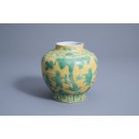 A Chinese green and yellow glazed vase with playing boys, Wanli mark, 19th/20th C.