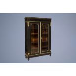 A Napoleon III gilt bronze mounted two-door display cabinet, 19th C.