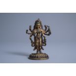 A Sino-Tibetan gilt bronze figure of the eight-armed Tara, 19th/20th C.