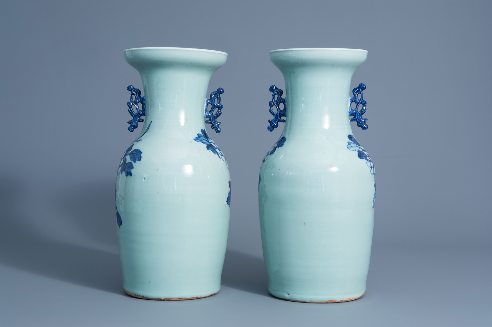 A pair of Chinese blue and white celadon vases with cranes on a rock, 19th C. - Image 3 of 6