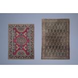 Two Oriental rugs with floral design, wool and silk on cotton, 20th C.