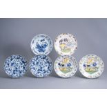 Six Dutch Delft blue, white and polychrome chargers with floral design, 18th C.