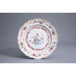 A Chinese famille rose dish with a European flute player, Qianlong