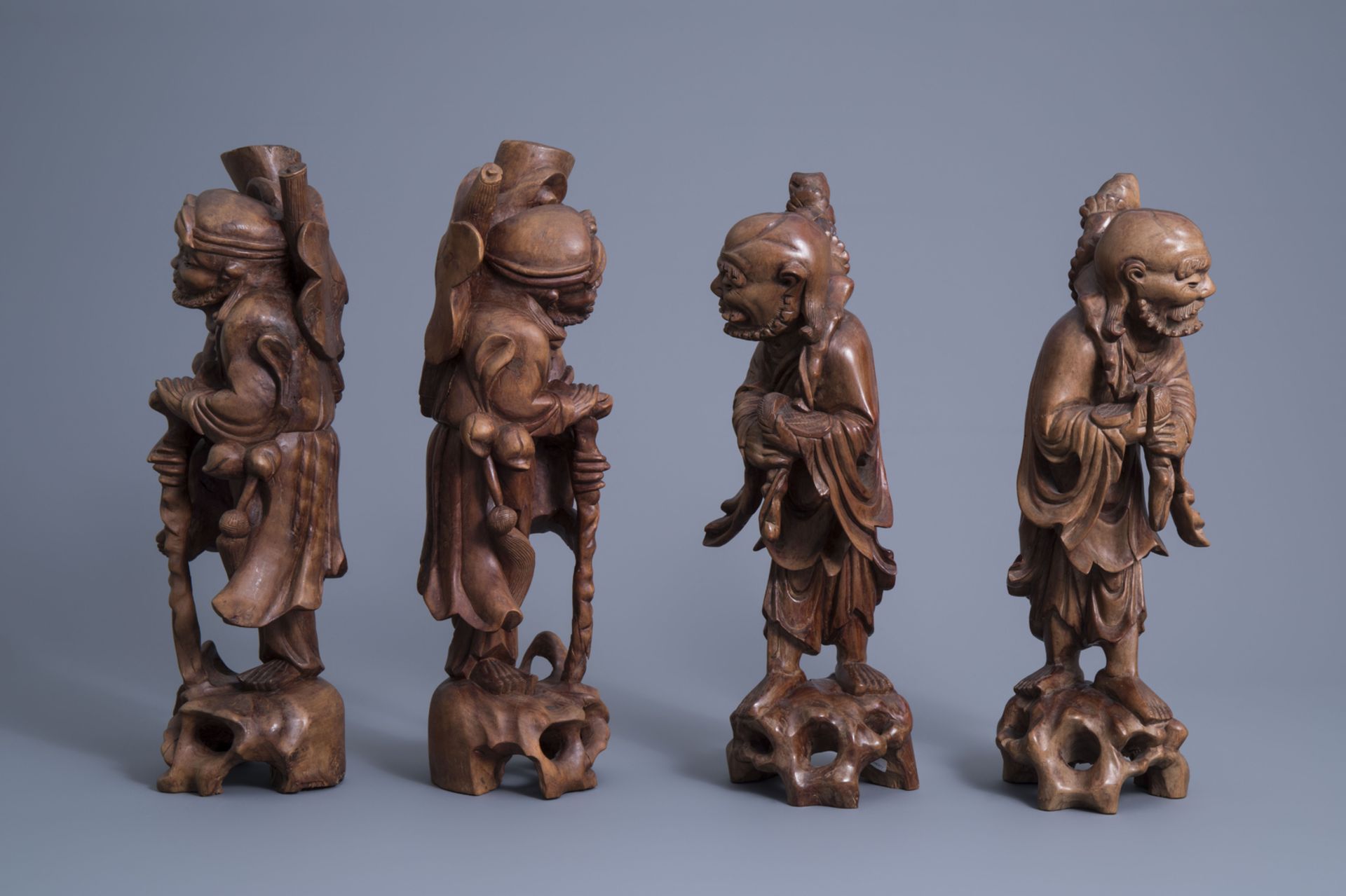 Four Chinese carved wooden figures of immortals, 19th/20th C. - Image 5 of 7