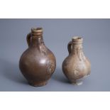 Two German stoneware bellarmine jugs, 17th C.