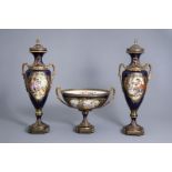 A gilt bronze mounted three-piece garniture with gallant scenes signed Lepage, Svres and Ch‰teau de