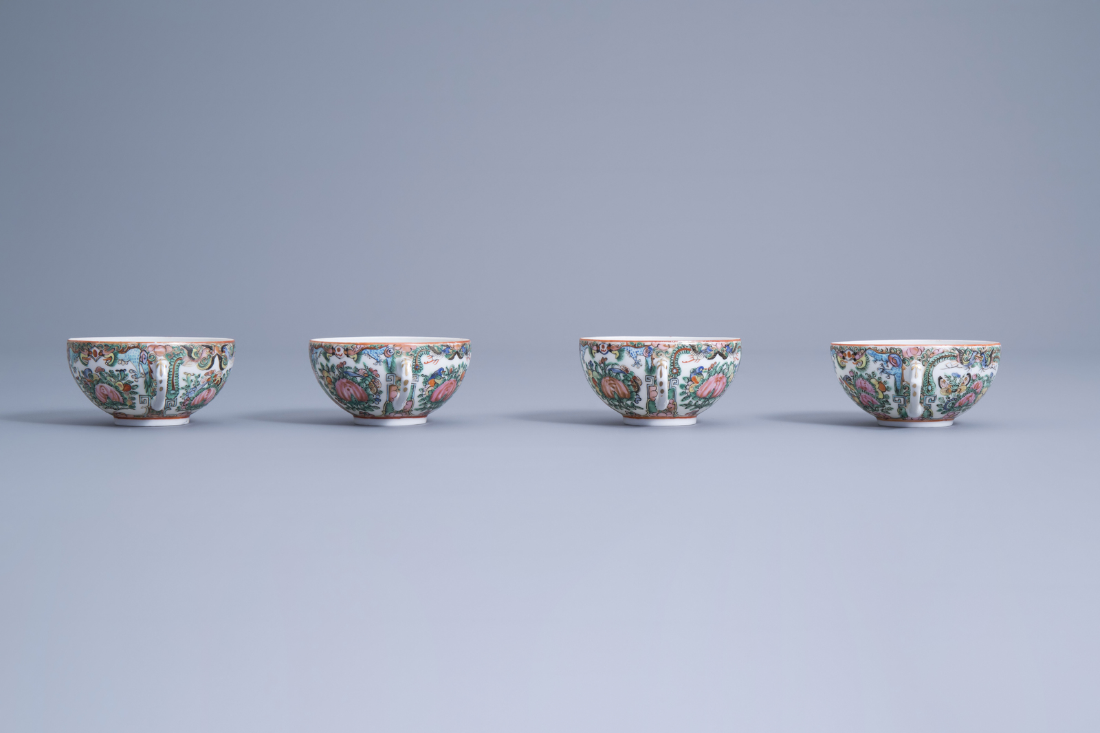 Four Chinese Canton famille rose cups, five saucers, two spoons and a wooden tray with inlay, 20th C - Image 9 of 17