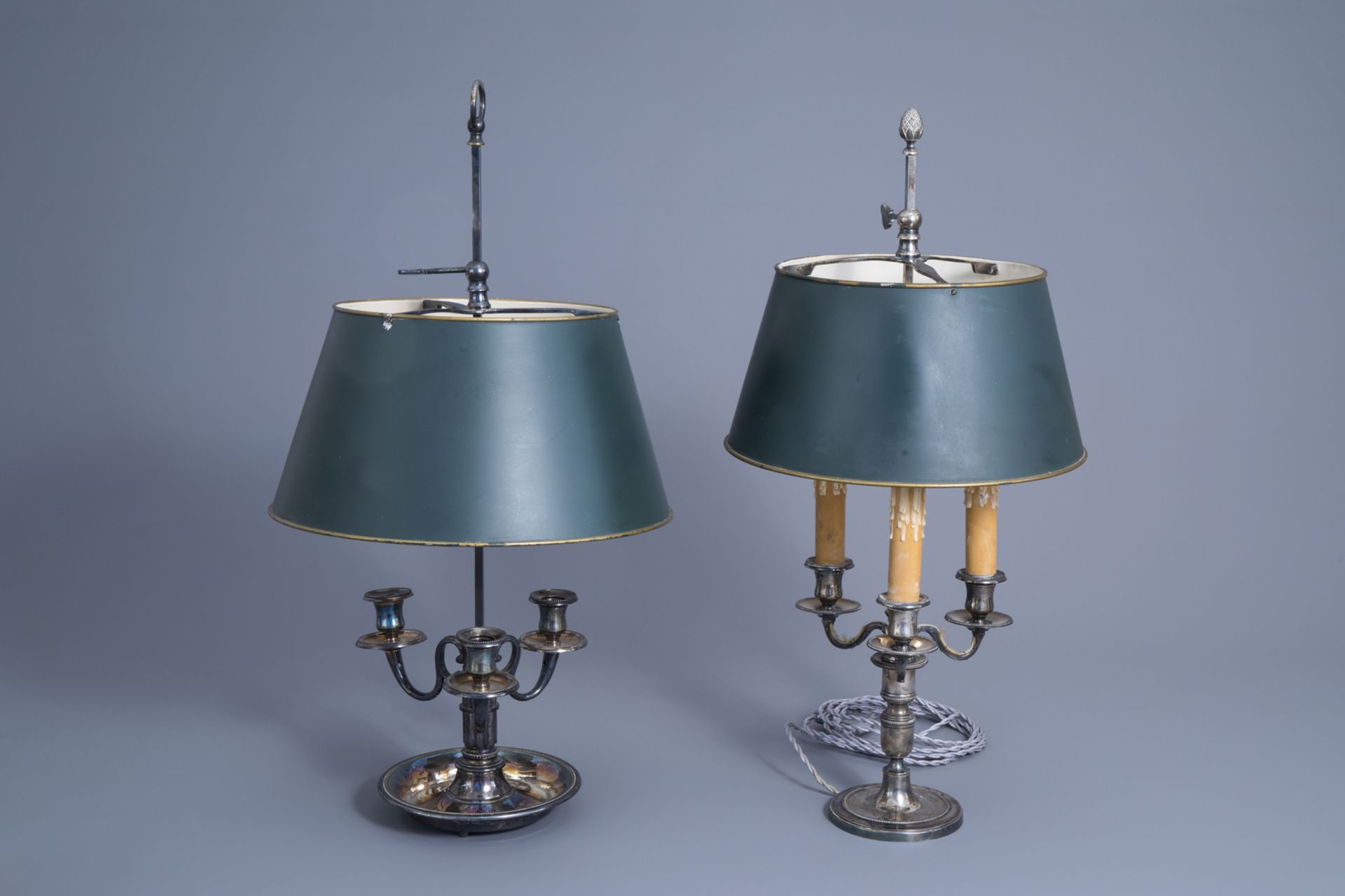 Two French silver plated Maison Charles bouillotte three-light lamps, third quarter of the 20th C.