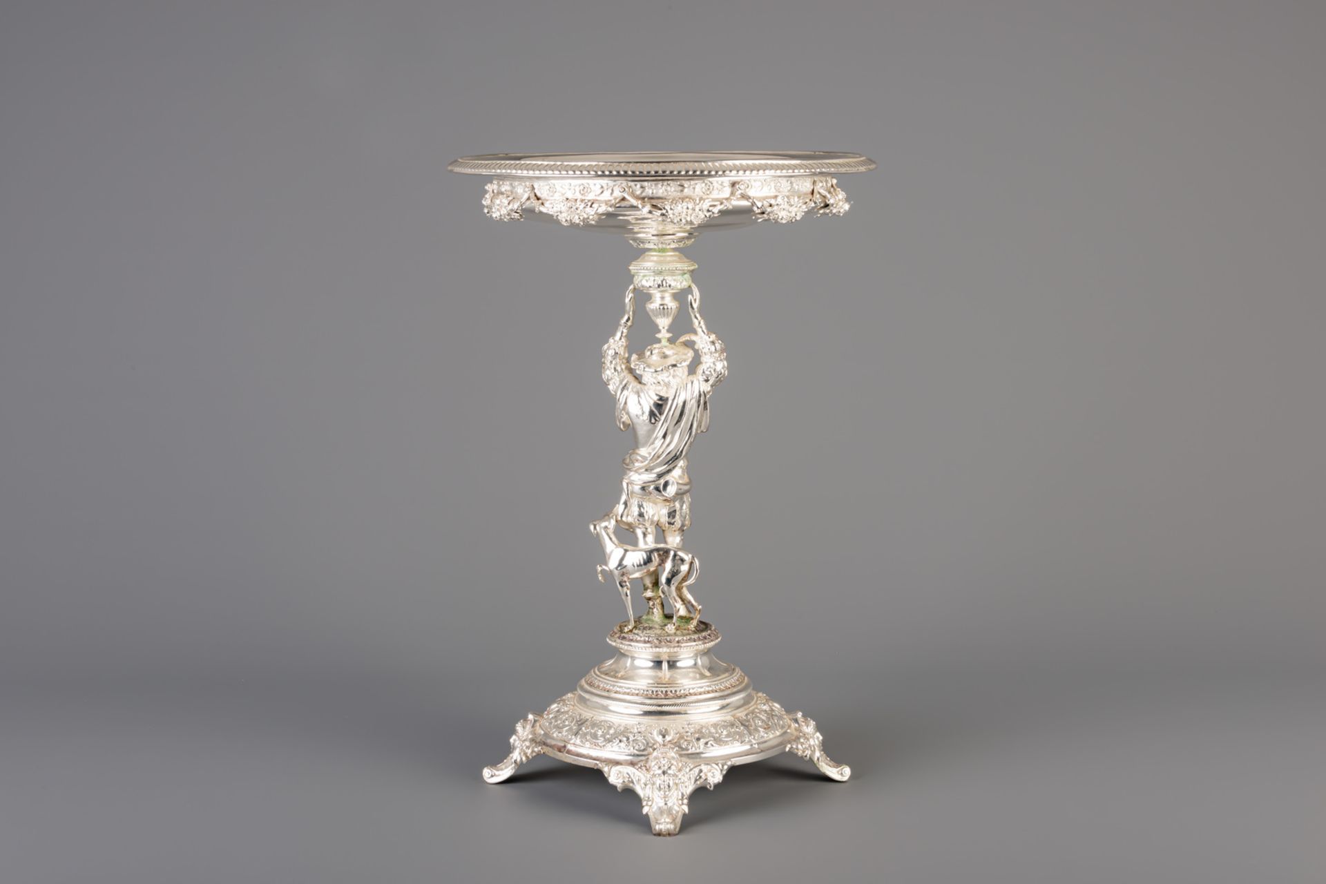 A German silver figural centerpiece with a nobleman and a greyhound during the hunt, 800/000, 19th C - Image 3 of 7