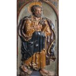 A large South European carved and polychrome painted alto relievo depicting Saint Peter, 17th C.