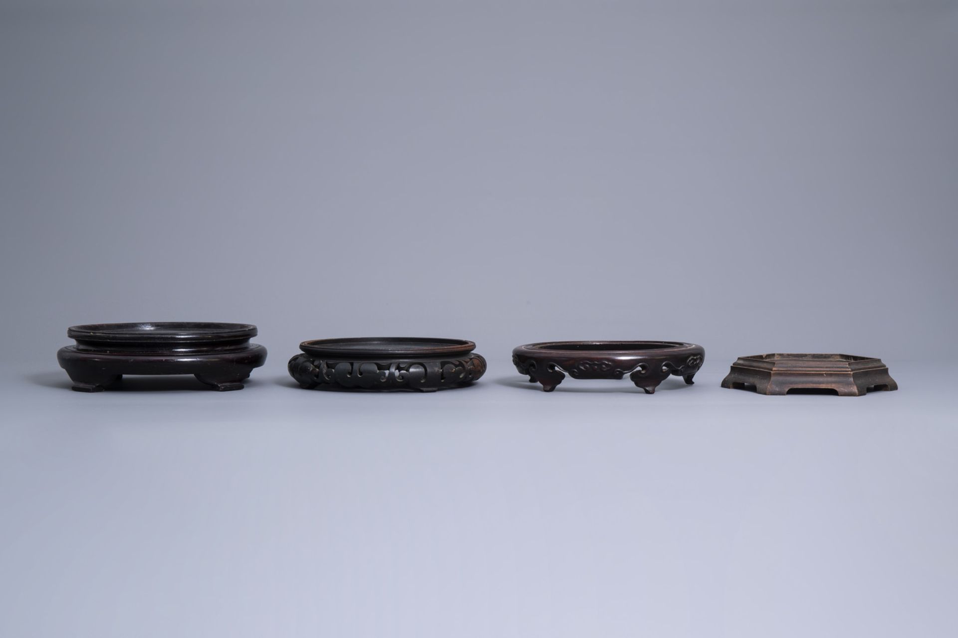 A collection of Chinese wooden stands, 19th/20th C. - Image 8 of 23