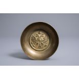 Peter Carl FabergŽ (1846-1920): A brass bowl with an imperial double-headed eagle, Moscow, dated 191