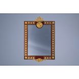 A French wooden mirror with gilt mounts and plaques with floral design in the Svres manner, 20th C.