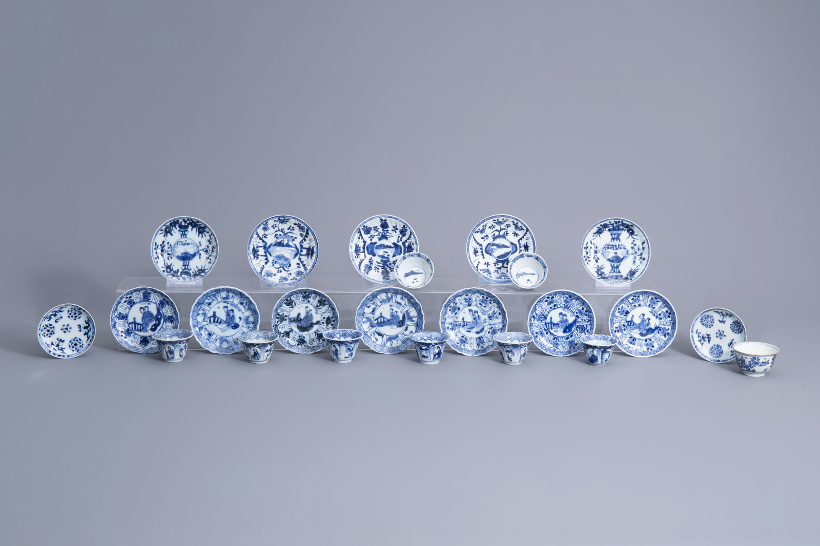 Nine Chinese blue and white cups and fourteen saucers, Kangxi