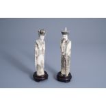 A pair of Chinese ivory carved figures of the emperor couple, ca. 1920