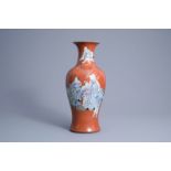 A Chinese red coral ground famille rose baluster vase with Immortals, Qianlong mark, Republic