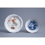 A Japanese blue and white Arita plate and a polychrome Kutani plate, Edo/Meiji