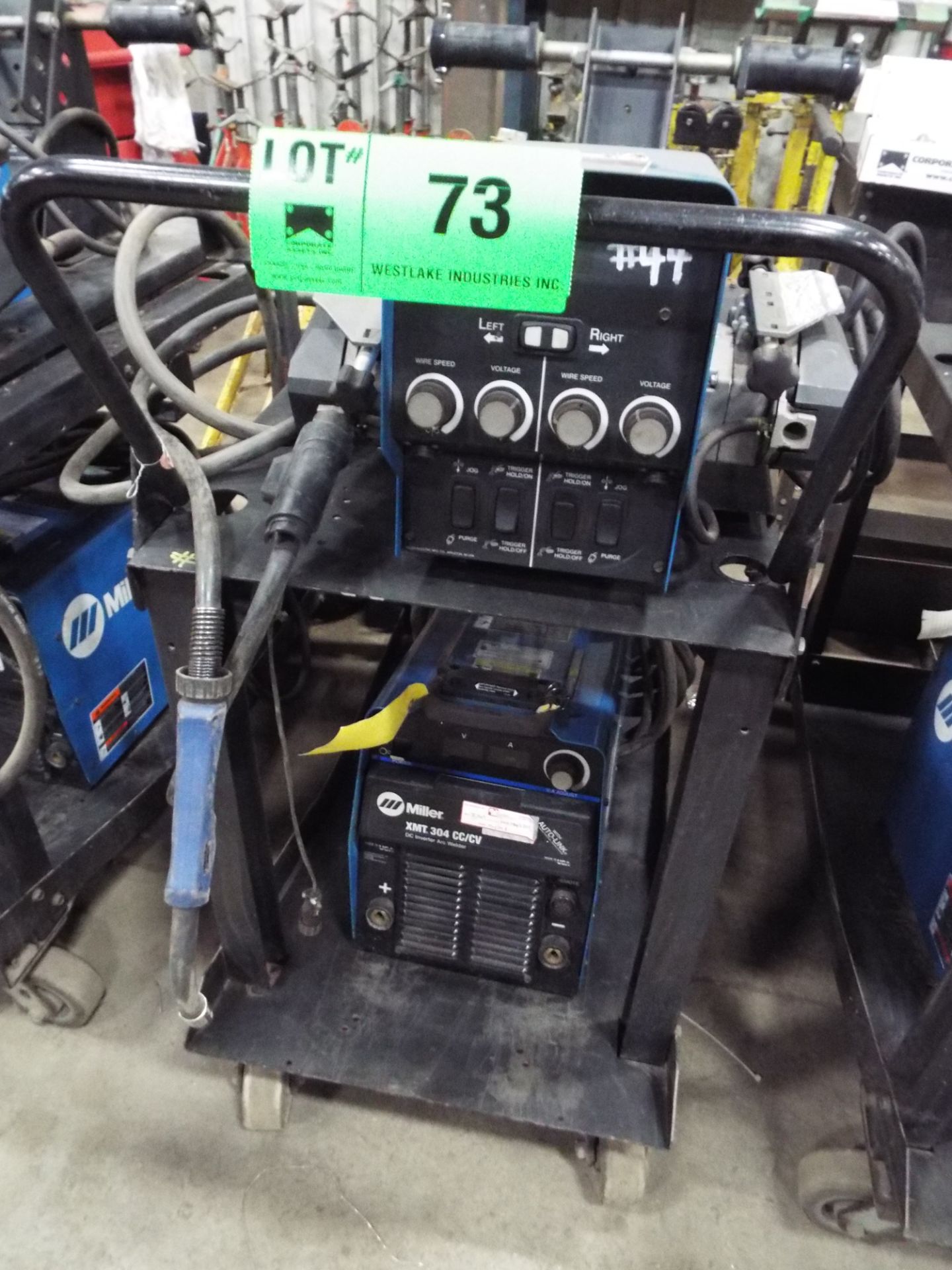 MILLER (2006) XMT 304 CC/CV MIG WELDER WITH MILLER 70 SERIES 24V TWIN REEL WIRE FEEDER, CABLES &