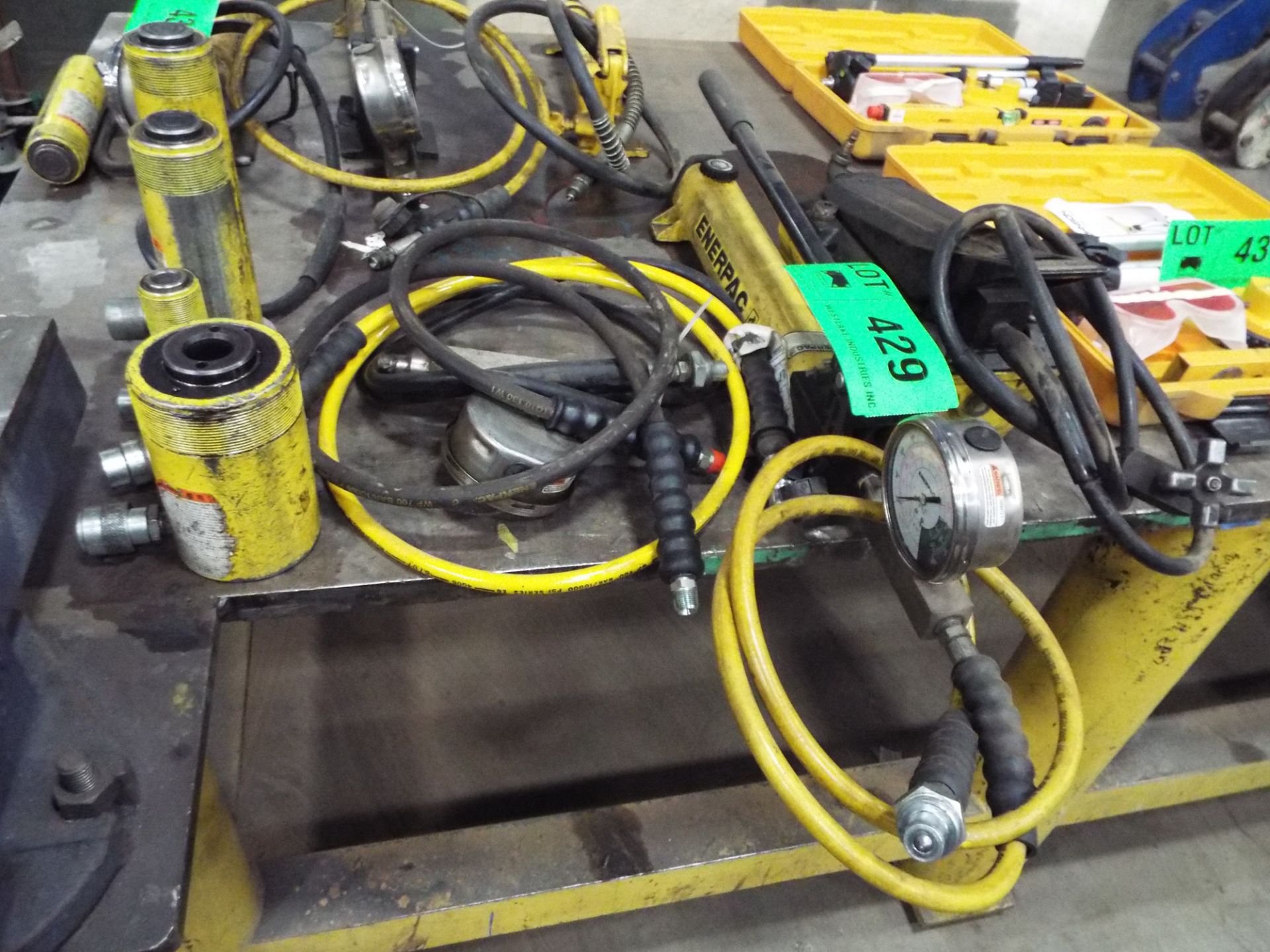 LOT/ ENERPAC HYDRAULIC JACK WITH ENERPAC FOOT CONTROL, SPARE HOSES WITH GAUGE AND ENERPAC PISTON