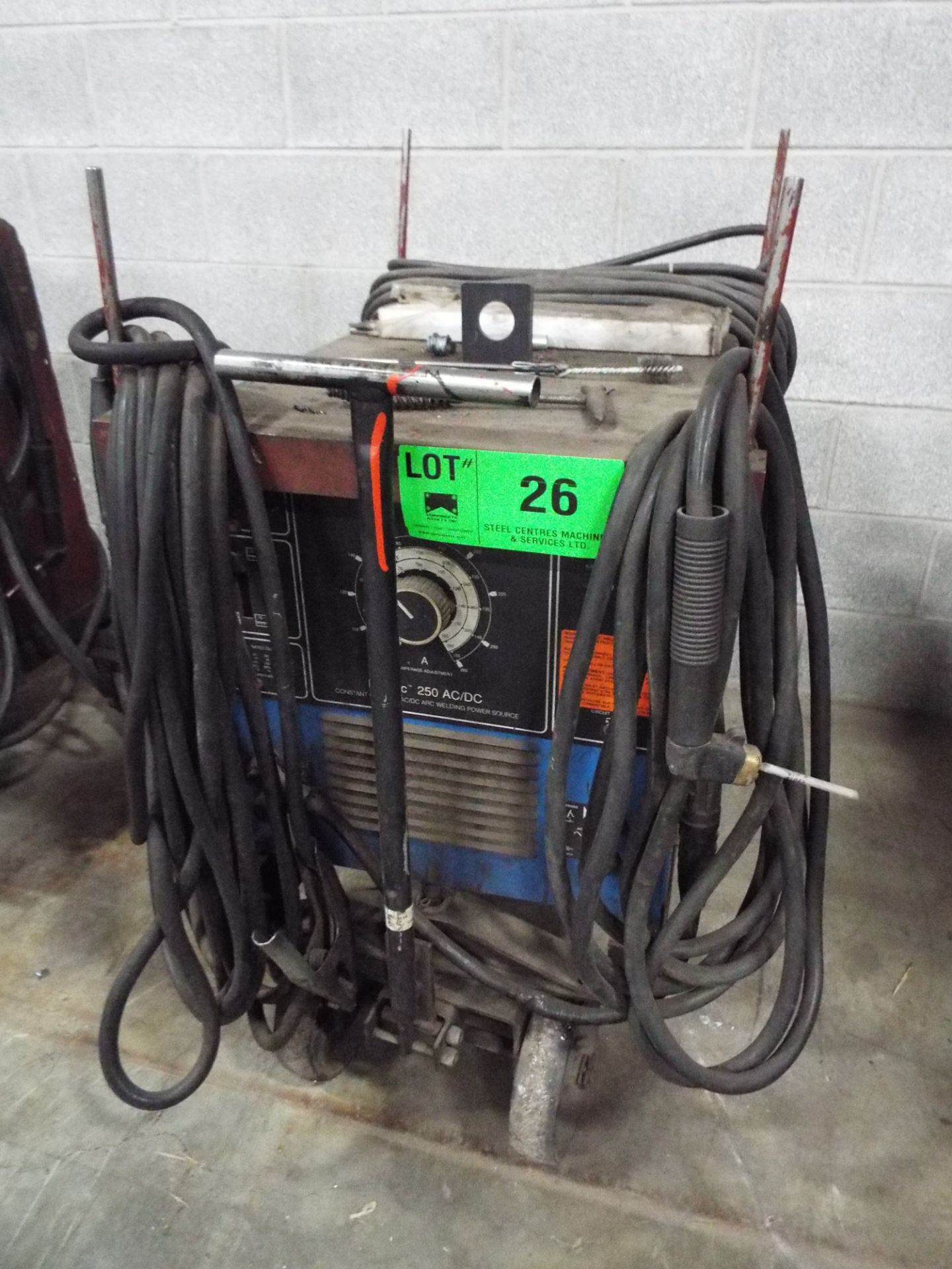 MILLER DIALARC 250 AC/DC ARC WELDER WITH CABLES AND GUN, S/N: N/A [RIGGING FEE FOR LOT #26 - $25 CDN