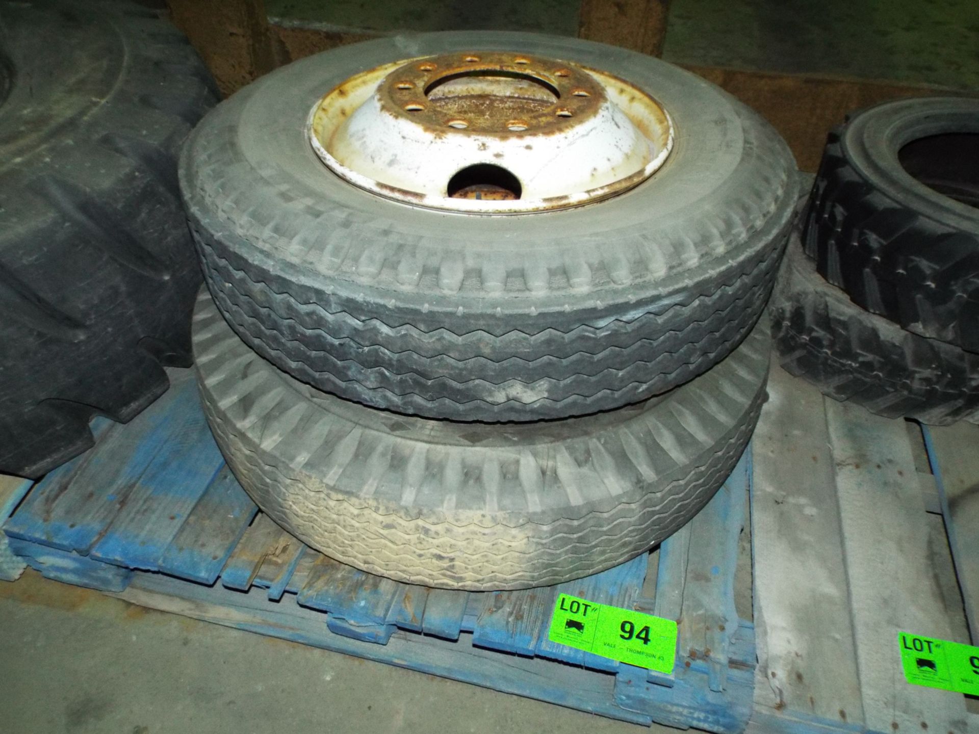 LOT/ (2) 11-22.5 HEAVY DUTY TIRES WITH RIMS