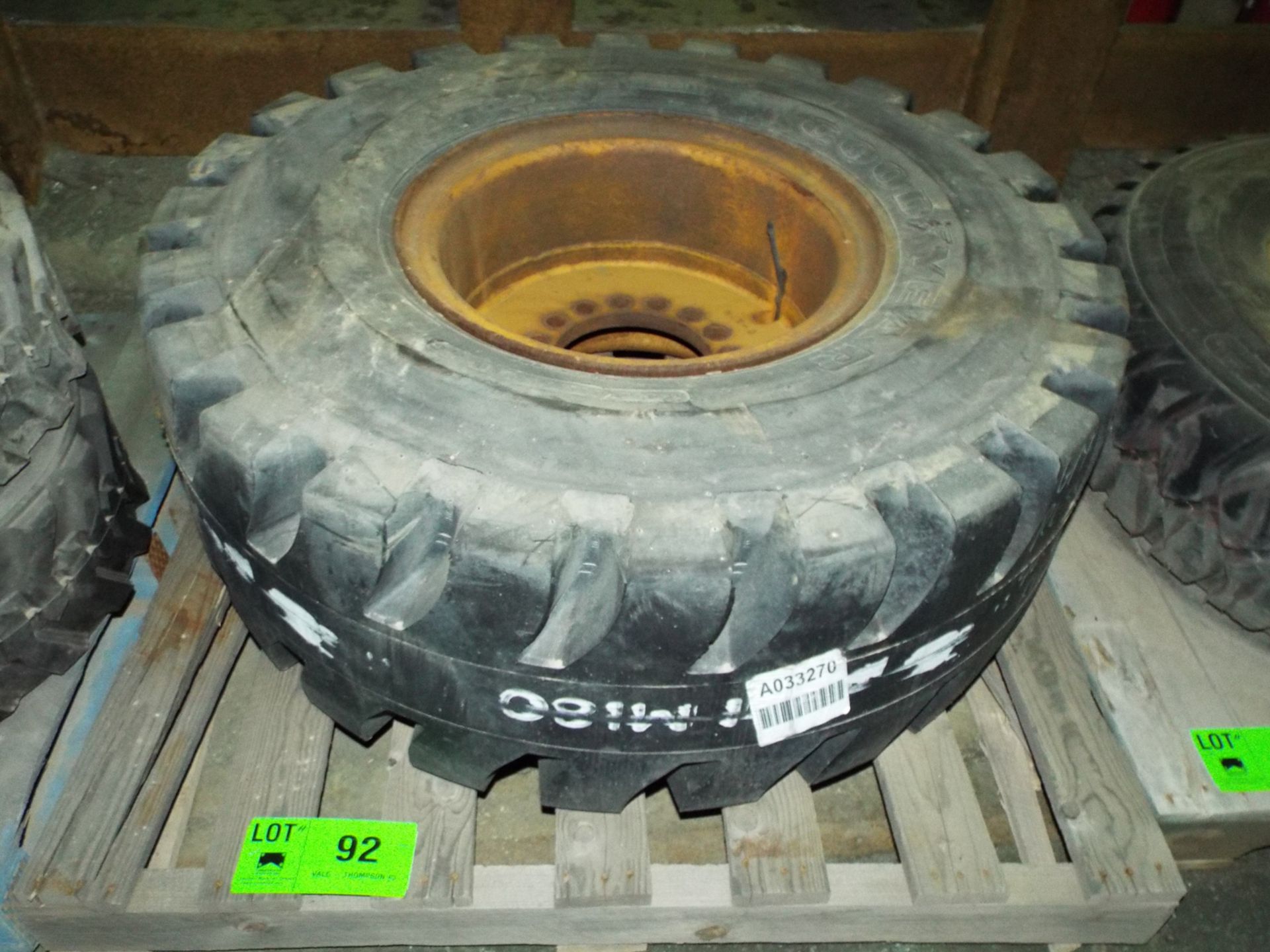 UNISTEEL L-5 TYPE 65 HEAVY DUTY TIRE WITH RIM