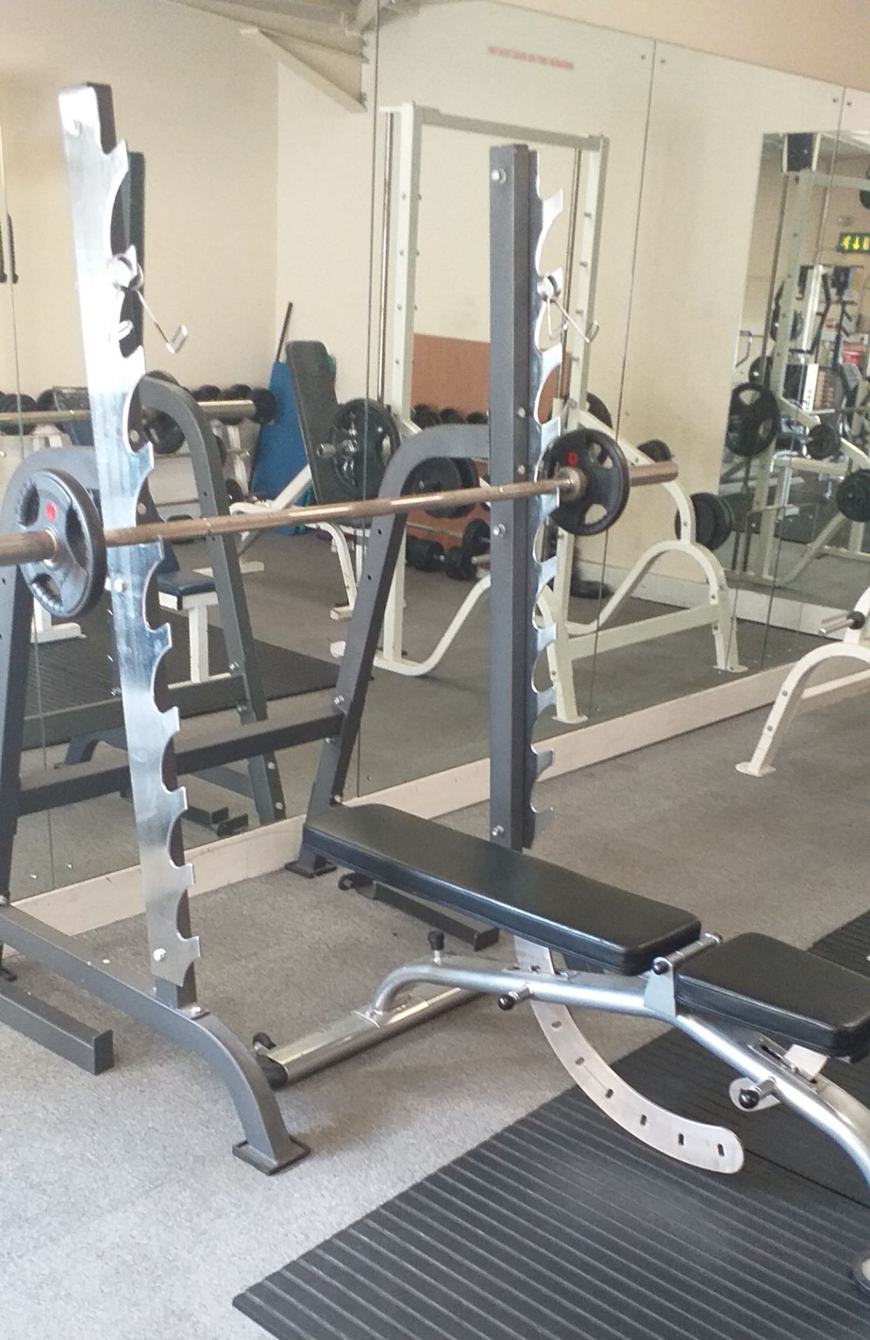 WEIGHT LIFTING BAR AND BENCH [RIGGING FEES FOR LOT #2044 - £100 PLUS APPLICABLE TAXES]