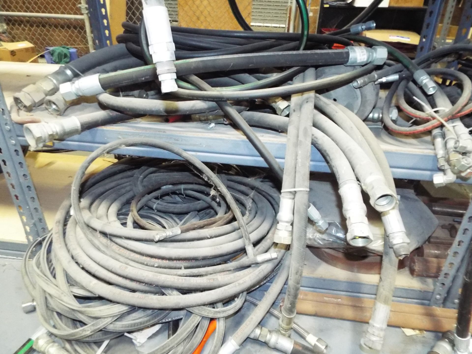 LOT/ CONTENTS OF SHELF - INCLUDING BUT NOT LIMITED TO HYDRAULIC HOSES VARIOUS SIZES, SECURITY - Image 2 of 3