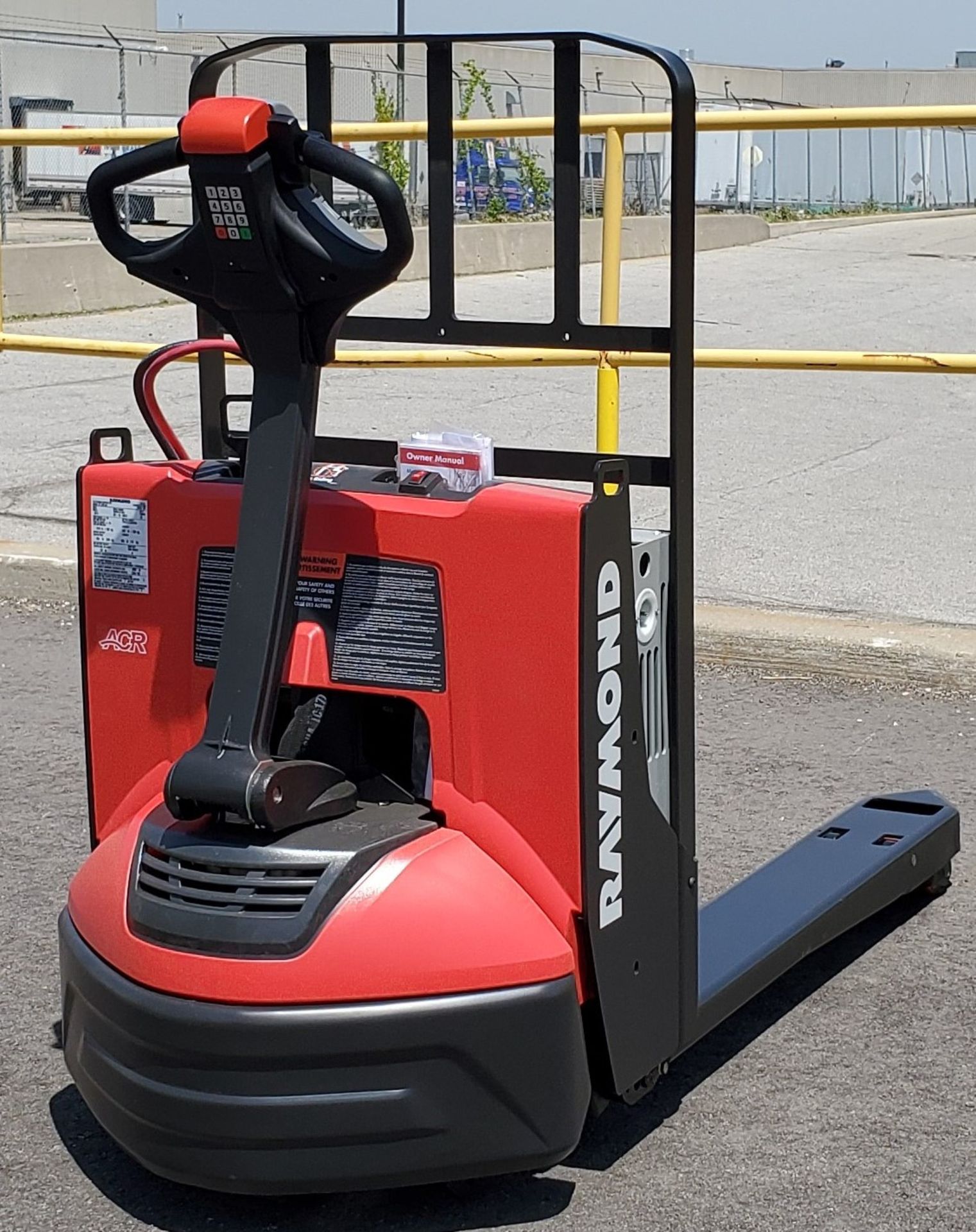 RAYMOND (2019) 8210 24V ELECTRIC WALK-BEHIND PALLET JACK WITH 4500 LB. CAPACITY, BUILT-IN CHARGER, - Image 2 of 2