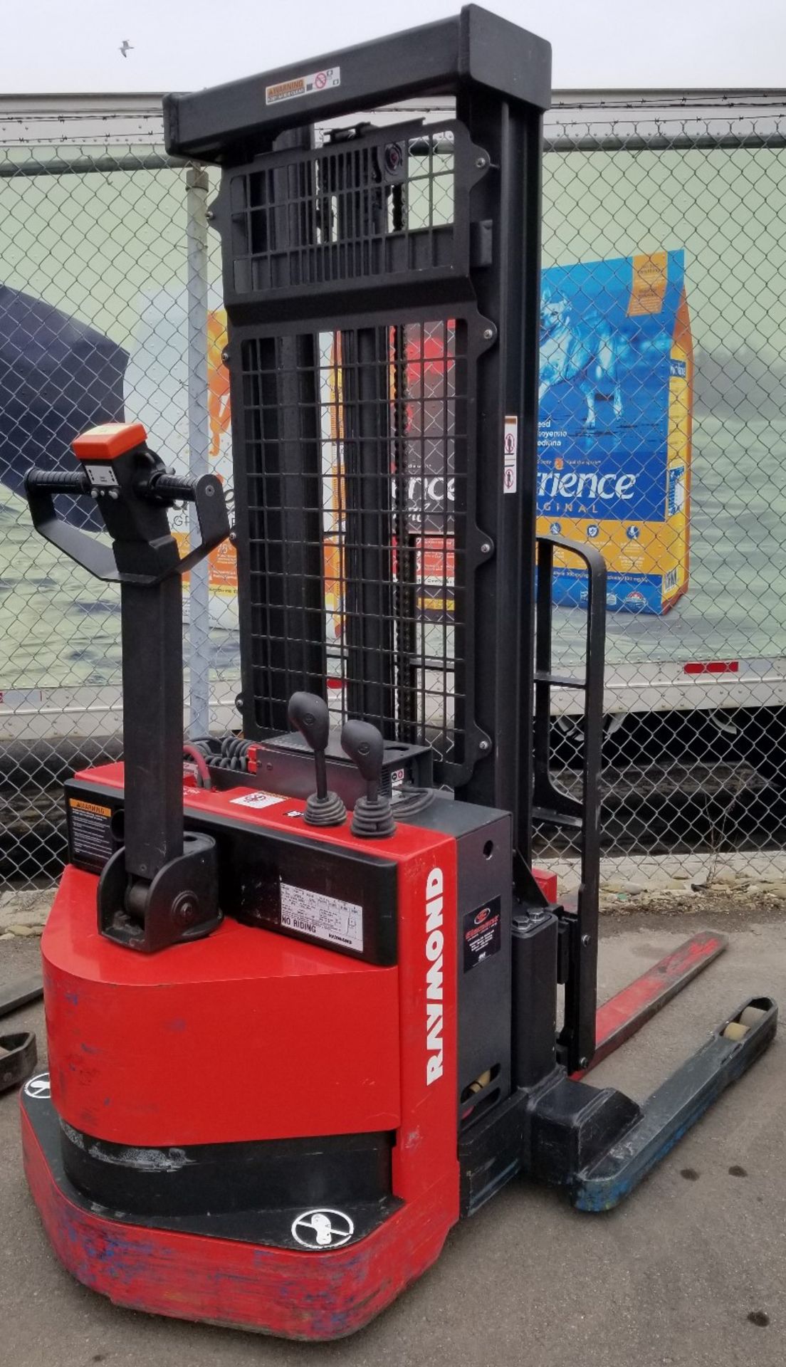 RAYMOND (2015) RSS40 24V ELECTRIC WALK-BEHIND STACKER TRUCK WITH 4000 LB. CAPACITY, 128" VERTICAL