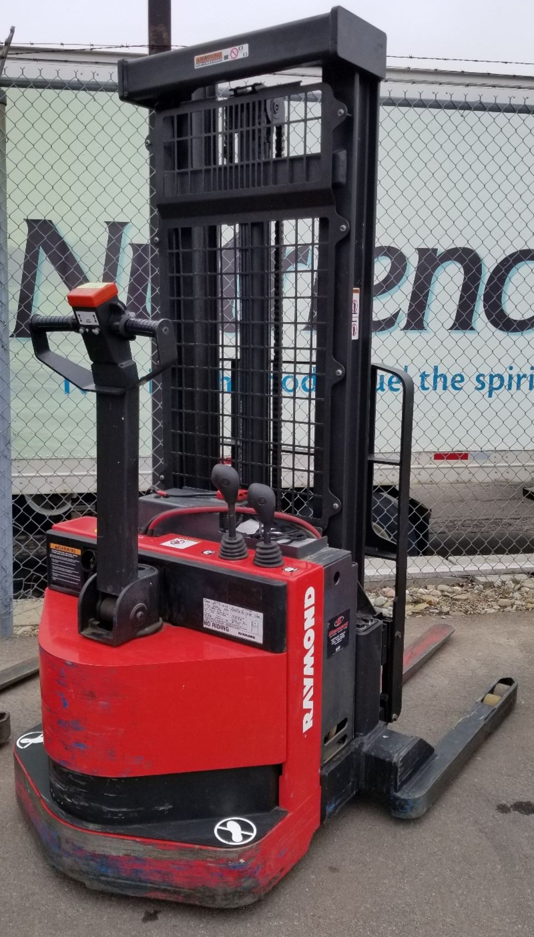 RAYMOND (2015) RSS40 24V ELECTRIC WALK-BEHIND STACKER TRUCK WITH 4000 LB. CAPACITY, 128" VERTICAL