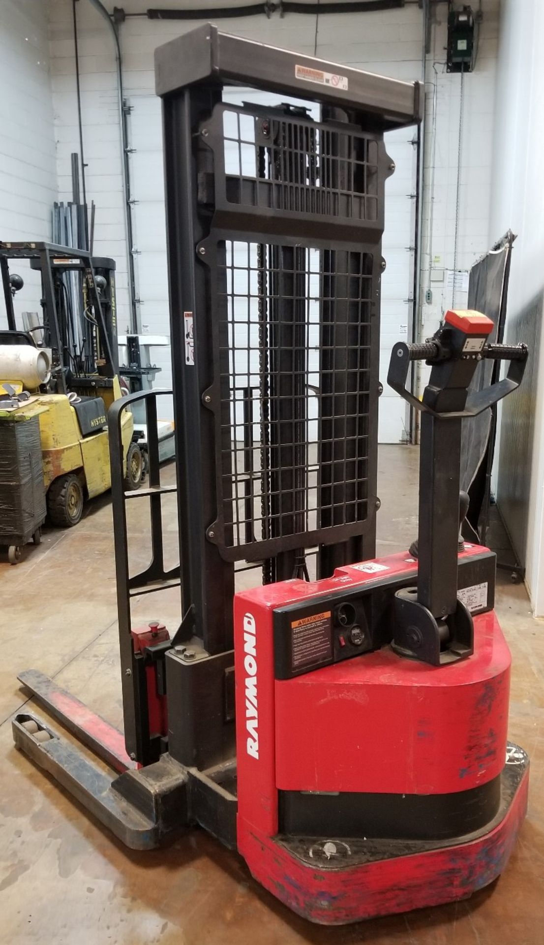 RAYMOND (2015) RSS40 24V ELECTRIC WALK-BEHIND STACKER TRUCK WITH 4000 LB. CAPACITY, 128" VERTICAL