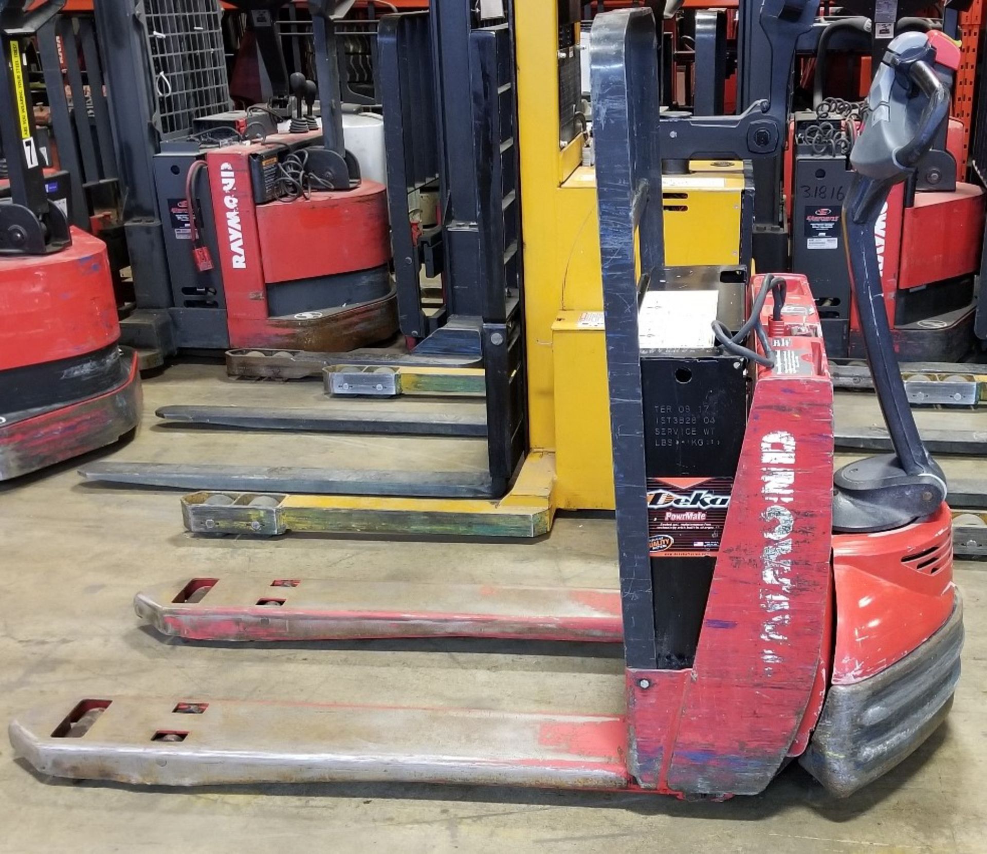 RAYMOND (2015) 102XM 24V ELECTRIC WALK-BEHIND PALLET JACK WITH 4500 LB. CAPACITY, BUILT-IN