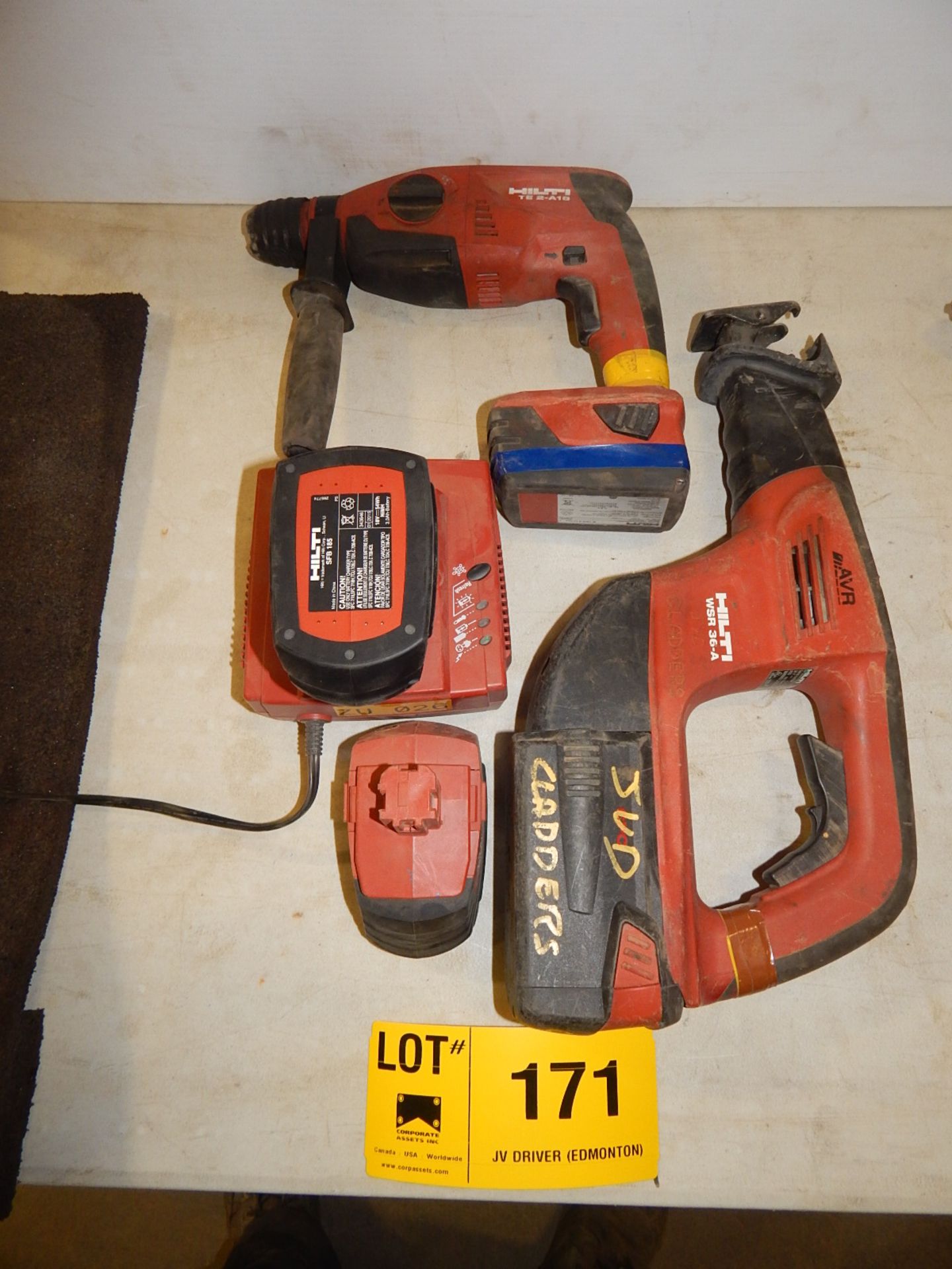 LOT/ HILTI CORDLESS HAMMER DRILL WITH SAWZALL, 4 BATTERIES, AND CHARGER