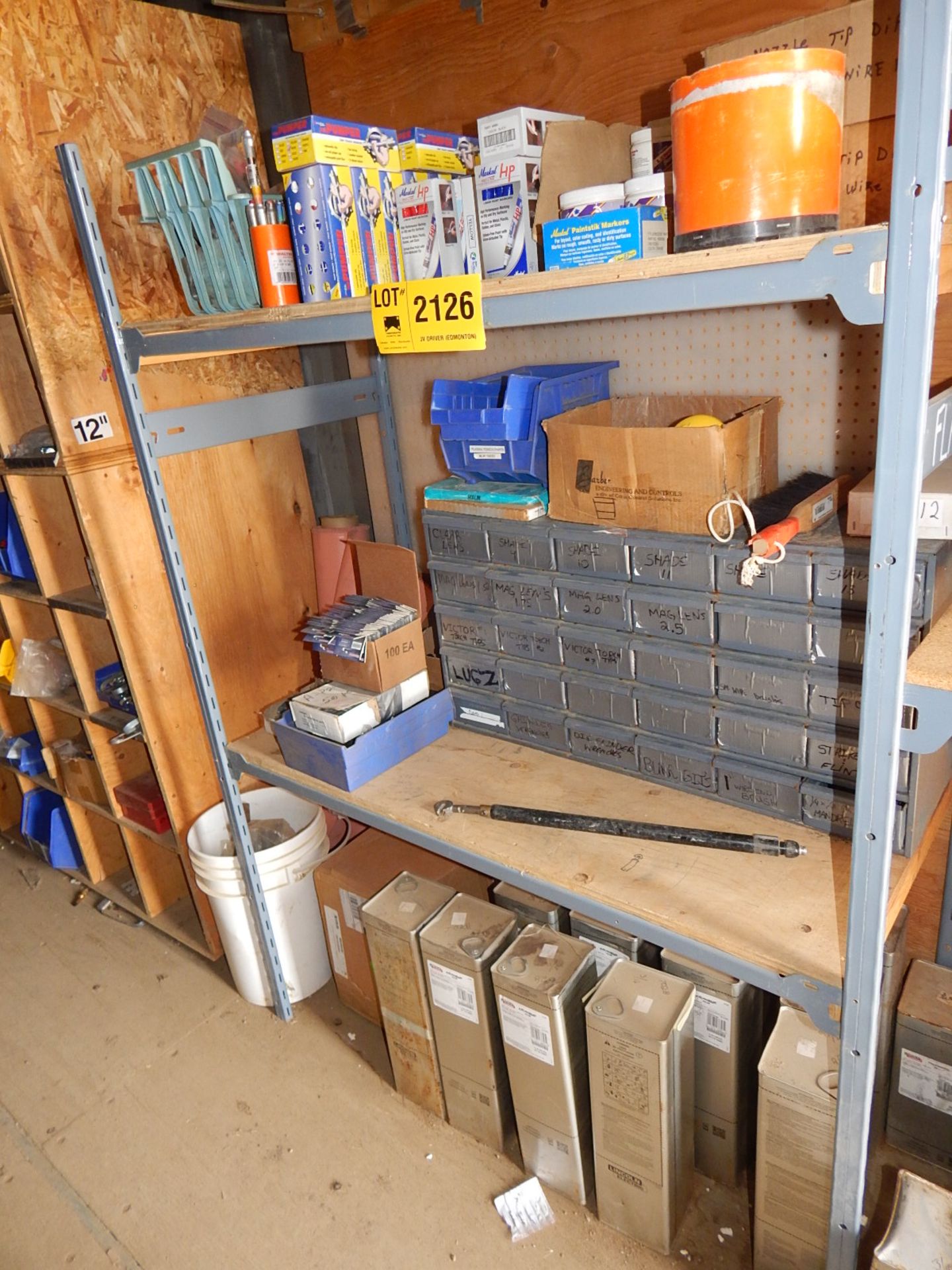 LOT/ SECTION OF SHELF CONSISTING OF WELDING ELECTRODES, LENSES, AND PAINT MARKERS (SC 102)