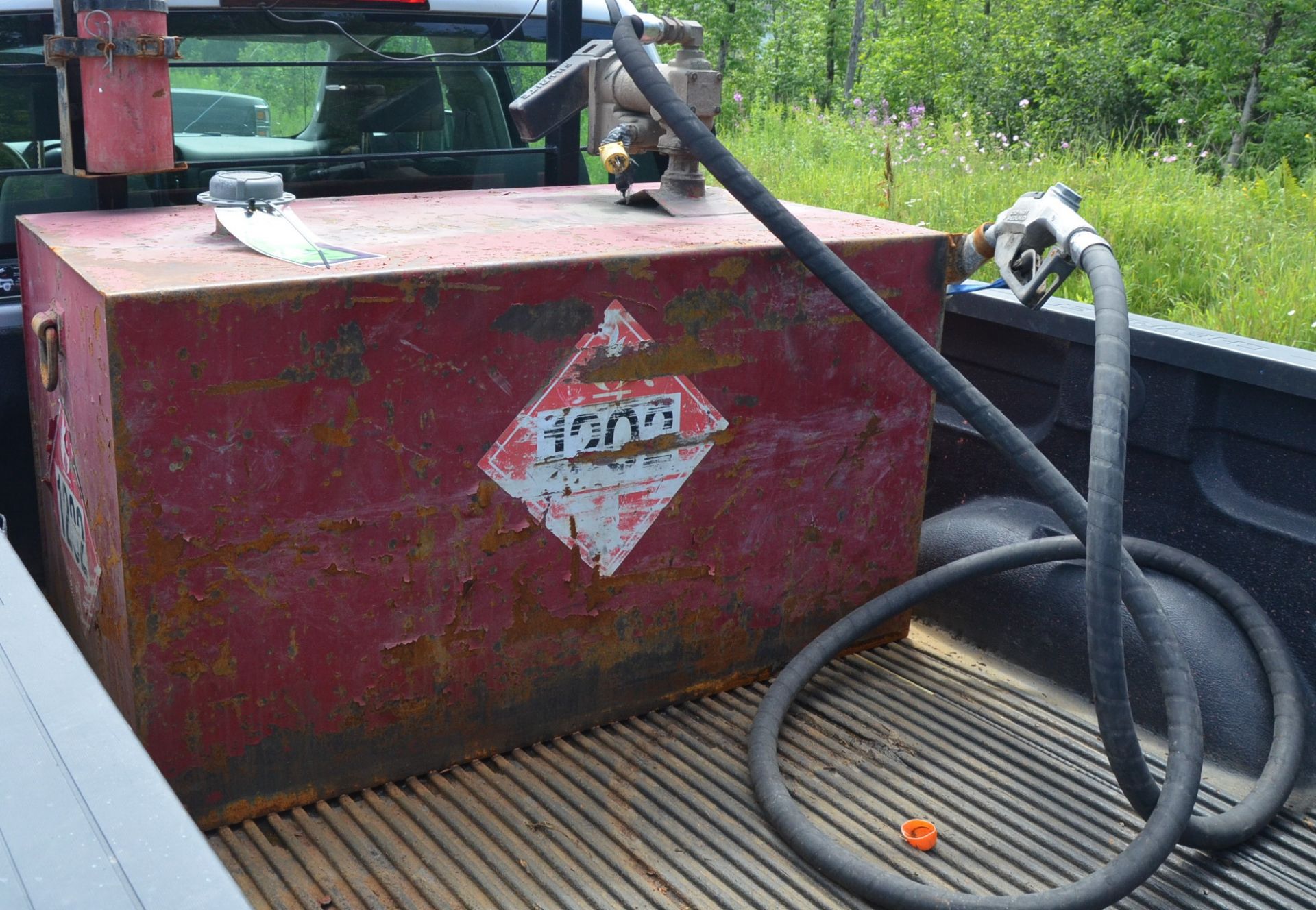 FUEL TANK WITH METERED DISPENSING PUMP WITH HOSE AND GUN, S/N N/A